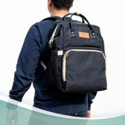 Luiertas Rugzak - Monx Luiertas Verzorgingstas Met Uitklapbaar Babybedje - Overzichtelijke Luierrugzak Extra Buggy En Kinderwagen Haken Inclusief Geïsoleerde Flessenhouder - Zwart -Babyproducten 1200x1200 309